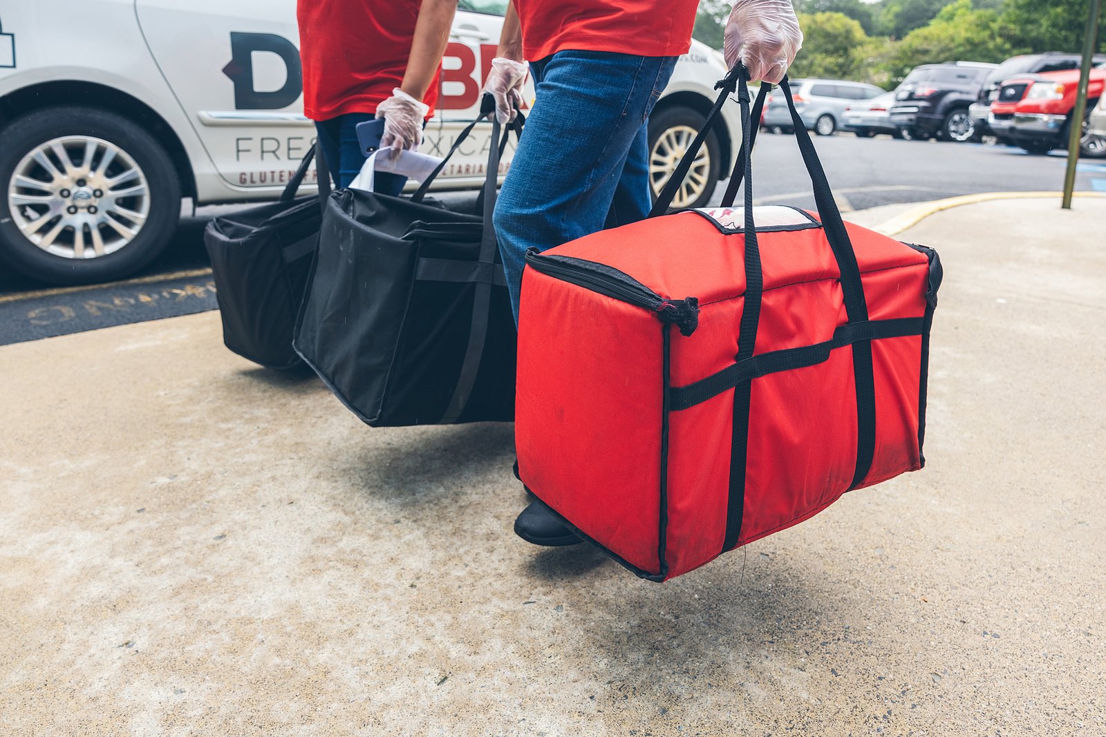 DosBros catering bags being delivered